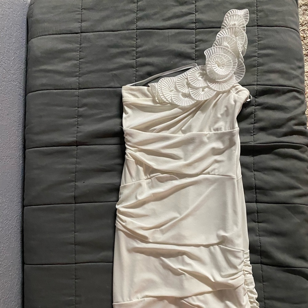 White one-shoulder B. Smart dress